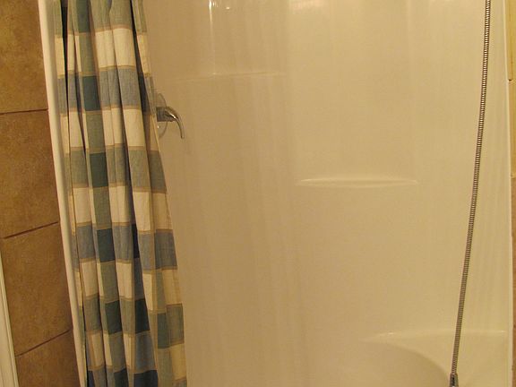 double shower heads & a seat