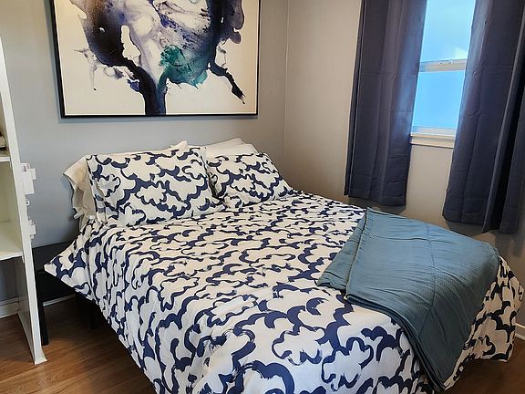 The patio door in the bedroom has a window (not pictured), and the room itself has two additional windows, so it's a lovely place to rest.