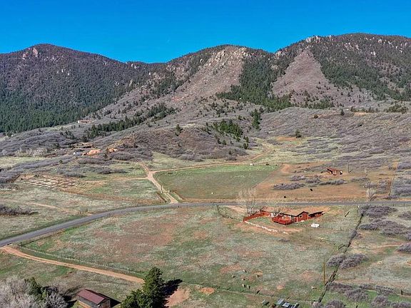 Arial View of Property. Lot extends well past the right of the photo. (Right of photo shows barn and storage shed.)
