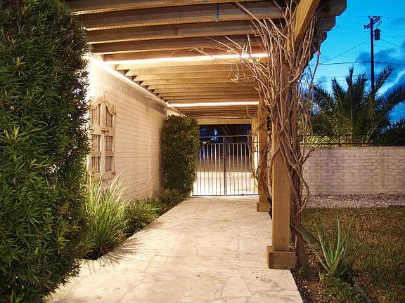 Arbored well lit front entry
