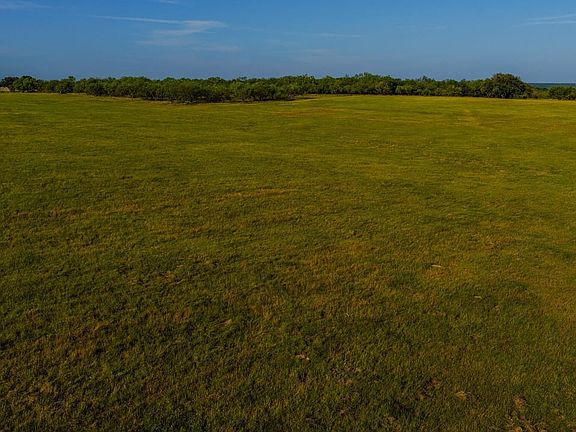North Fork Ranch, mature oak trees, ponds, improved grasses, underground water, utilities
