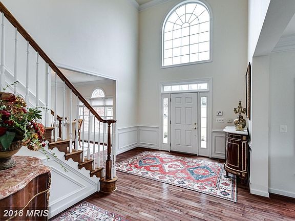 Grand, bright and inviting foyer and entrance