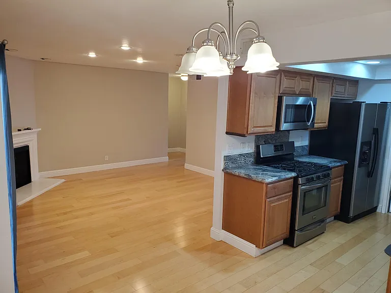Living room, dining area and kitchen