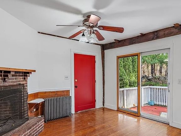 Kitchen with Fireplace to Private Deck and backyard