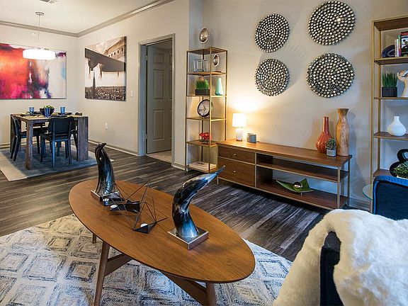 Apartment Dining and Living Room with wood floors.