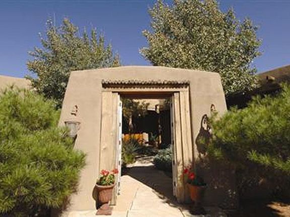 This home, built and designed by Michael Kern, is a beautiful three bedroom residence on a lushly la