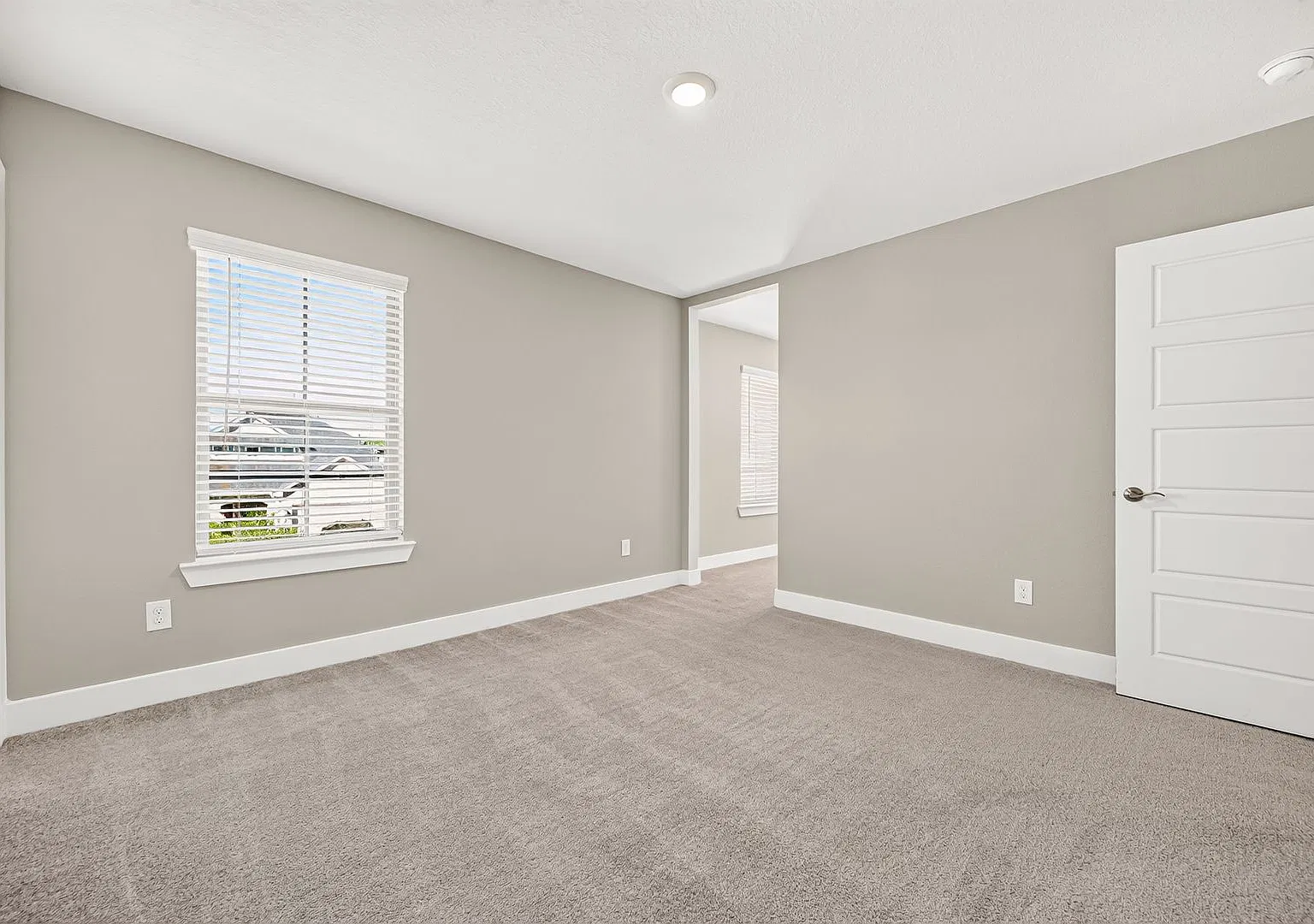 This spacious 4-bedroom, 2.5-bath home features a bright, open-concept floor plan with neutral fi... — Photo 2