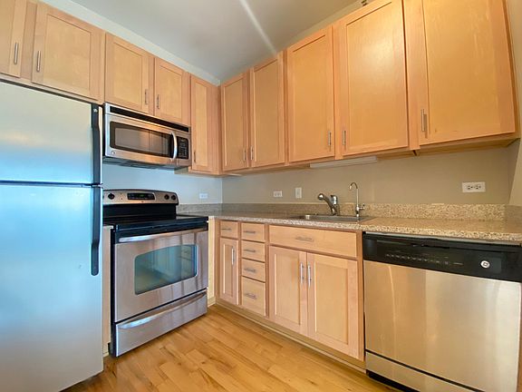 4th image of 1 E 8th St APT 409