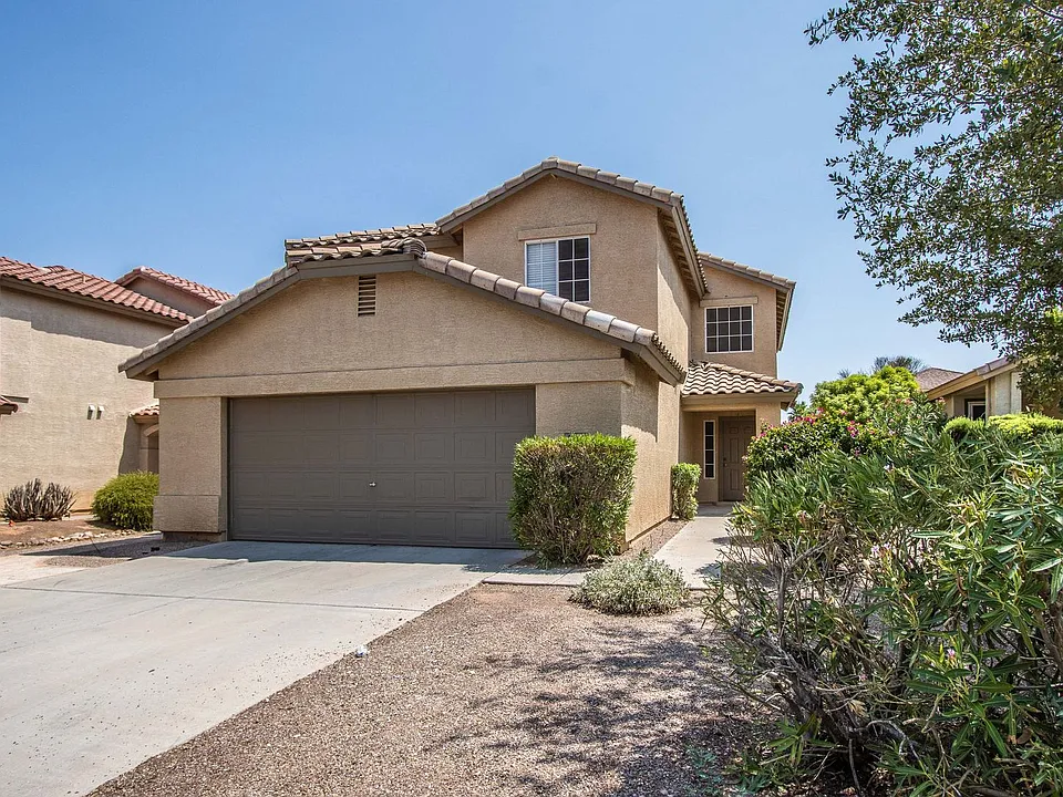 1037 E Desert Holly Dr