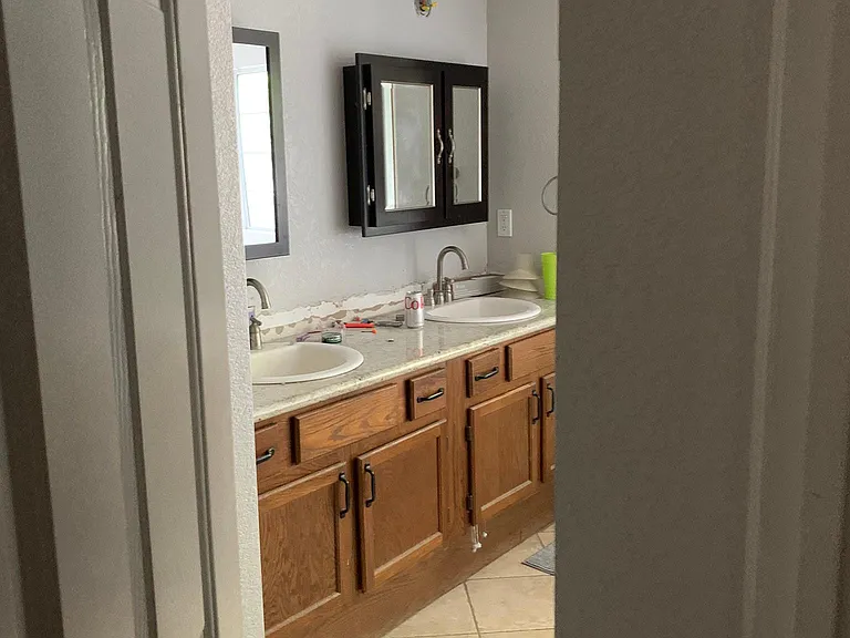 Main bedroom bath's double sinks