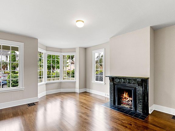 Gas burning fireplace in the large living room