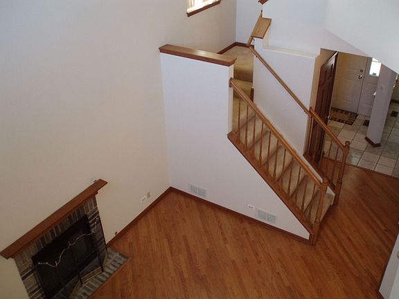 2-Story Living Room w/ Fireplace