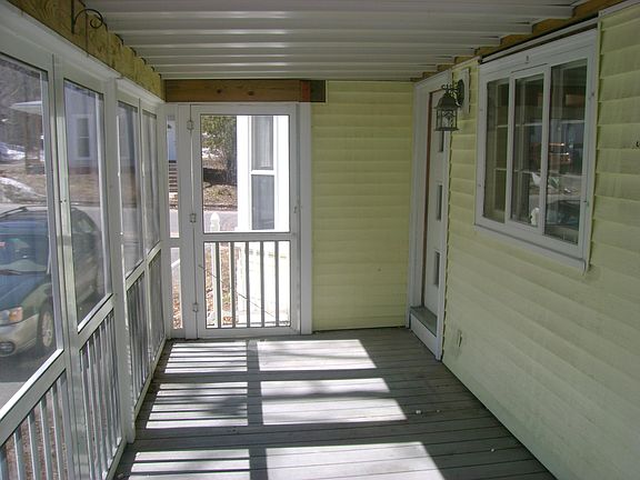 Wraparound porch looking toward street.
