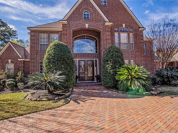 This home exudes style with harringbone brick details, 8' tall entry doors and extended circle drive; accented with cobblestone pavers. Roof replaced in 2015.