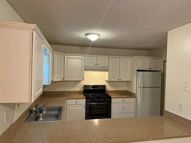 Kitchen with marble countertiops