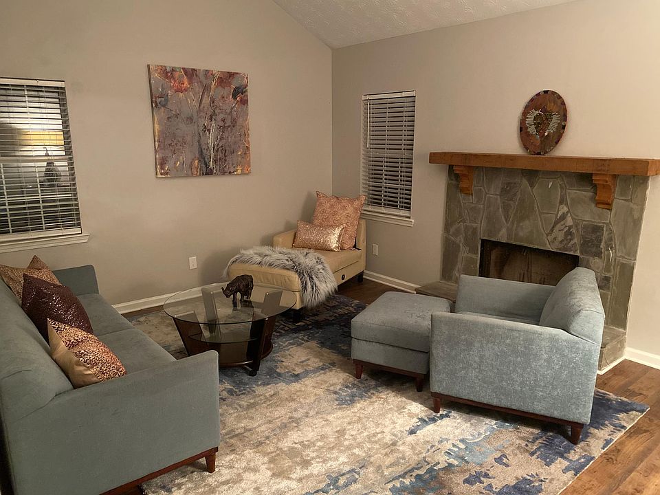 Livingroom- Warm and inviting gathering space that extends to the great outdoors.