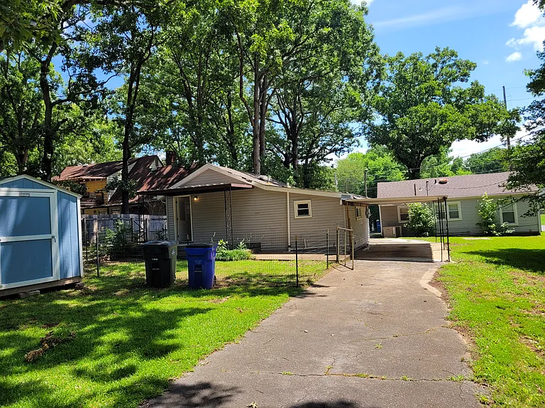 Private carport parking. Access from N Wood or from alley