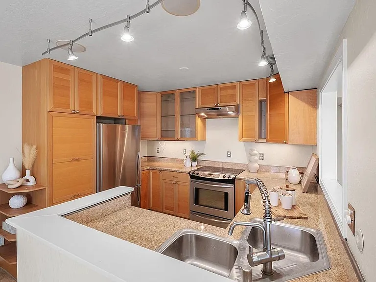 Spacious kitchen with lots of cabinets and pull-out pantry