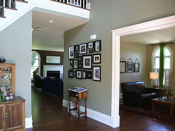 to the right of the grand entry is the living room, the great room in the back