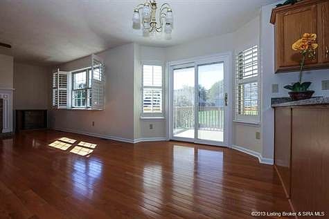 New custom sliders lead to back deck and picturesque back yard!