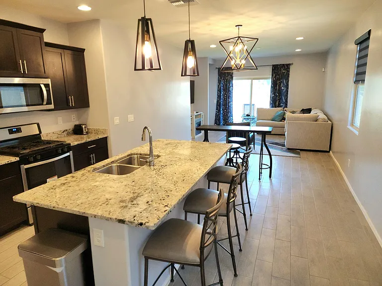 Open concept kitchen, dining, and living room