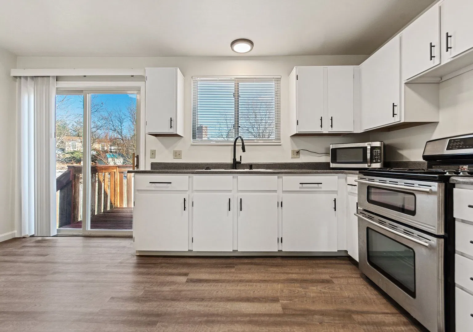 Charming 3-Bedroom, 2-Bathroom Split-Level Home with Large Yard — Photo 1