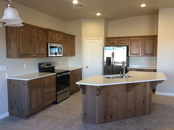 Kitchen has all new appliances, quartz counter tops, and pantry.