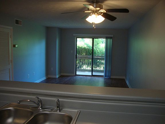 Enjoy the spacious open floor plan. The flooring and counters are newly installed!
