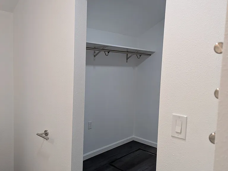 Walk in closet makes everything convenient and out of the way.