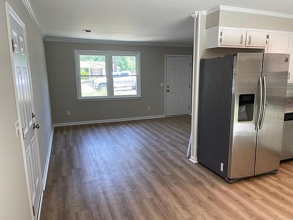 Large living room area with natural light