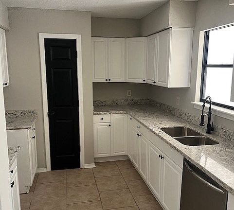 Granite Countertops and Stainless Steel Appliances...Stove Coming Soon.