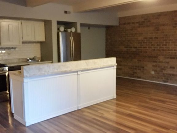 New stainless steel appliances with fresh paint and new floo