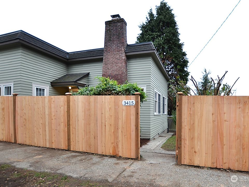 Street entry on 50th, brand new fence!>