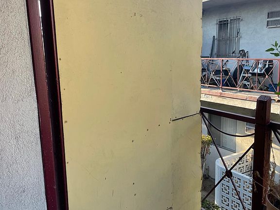 Balcony Door Access -Will be replaced with metal gate