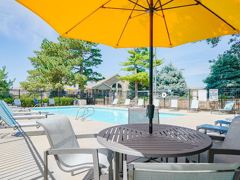 Enjoy snacks poolside at our shaded table.