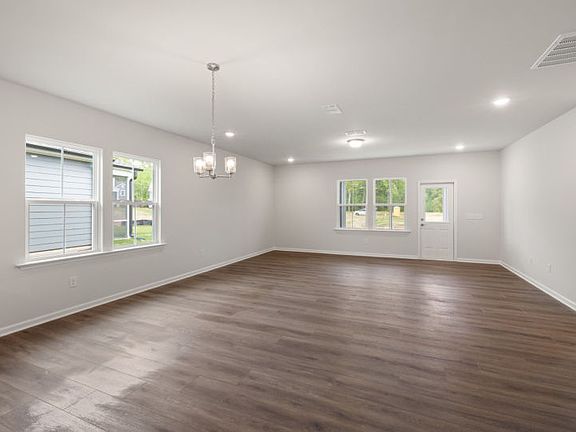 Great Room has access to Screened Porch Tons of Natural Light - Model Representation