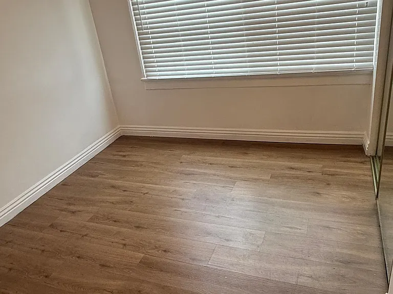 bedroom with sliding door closet