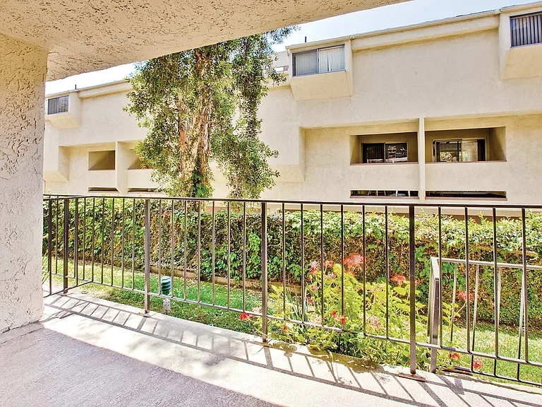 View the courtyard off your private balcony