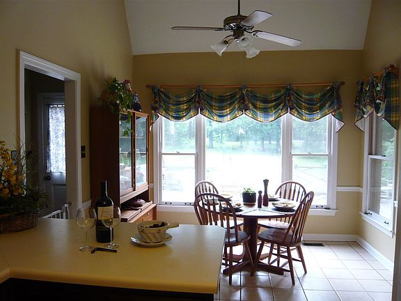 Spacious breakfast room with lots of natural light and great view of back yard