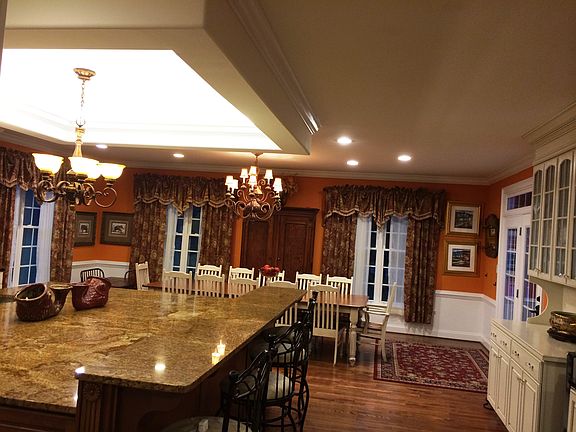 Gourmet eat-in kitchen with granite and hardwoods