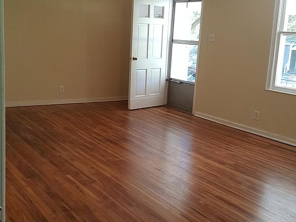 Large livingroom, refinished hardwood floors in livingroom a