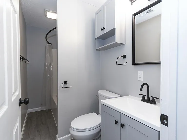 Bathroom with modern fixtures and lighting