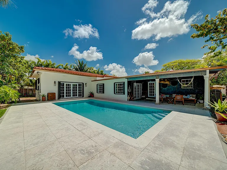 Rectangle sized pool with deep and swallow ends.