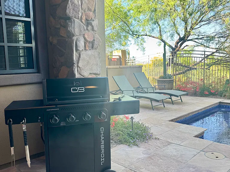 Personal grill on back patio to enjoy