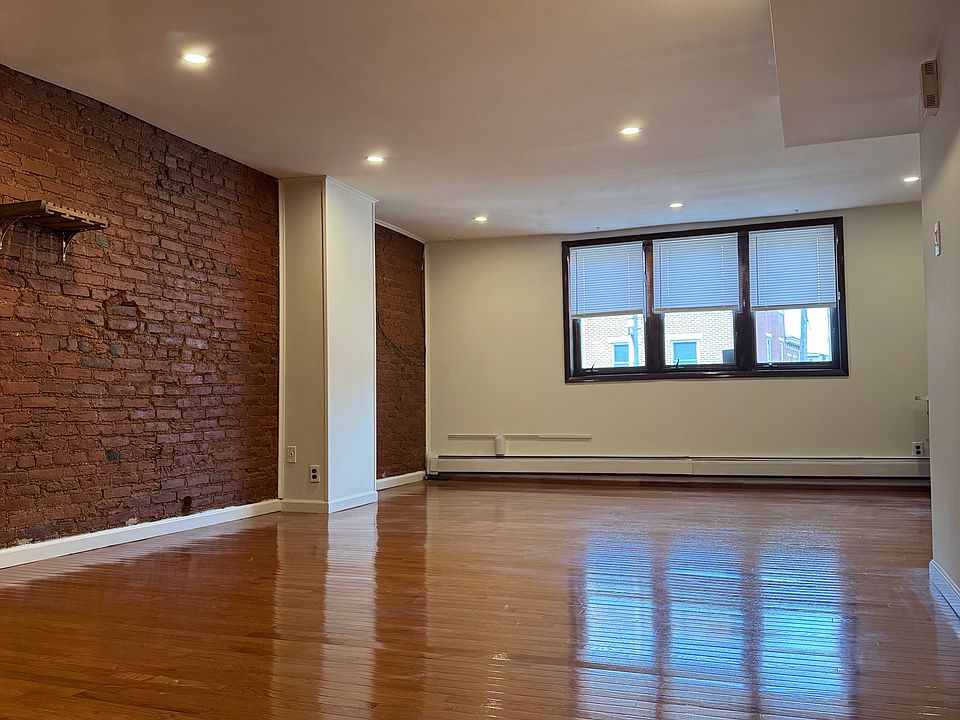 Living room with exposed brick