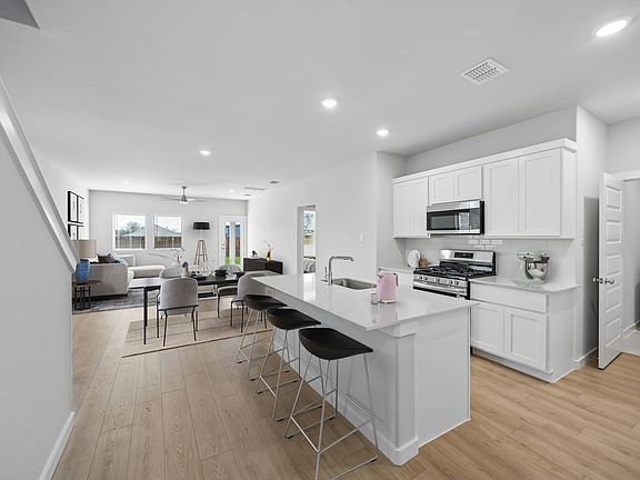 Open First Floor in the Mesquite home plan by Trophy Signature Homes - REPRESENTATIVE PHOTO