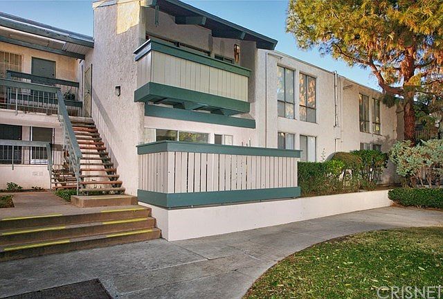 This quiet first floor unit is desirably tucked aw