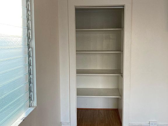 Closet in the front room area.