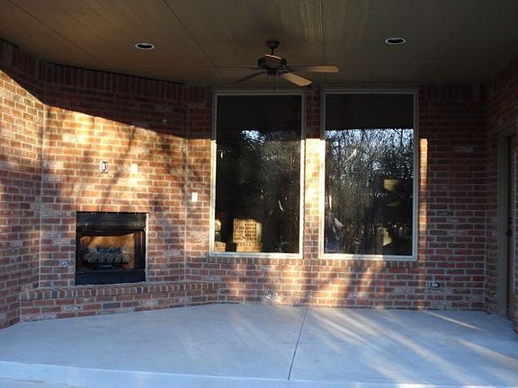 Outdoor Fireplace and Covered Porch