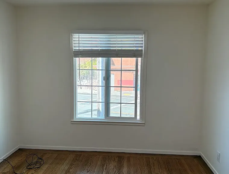 Front bedroom with finished flooring